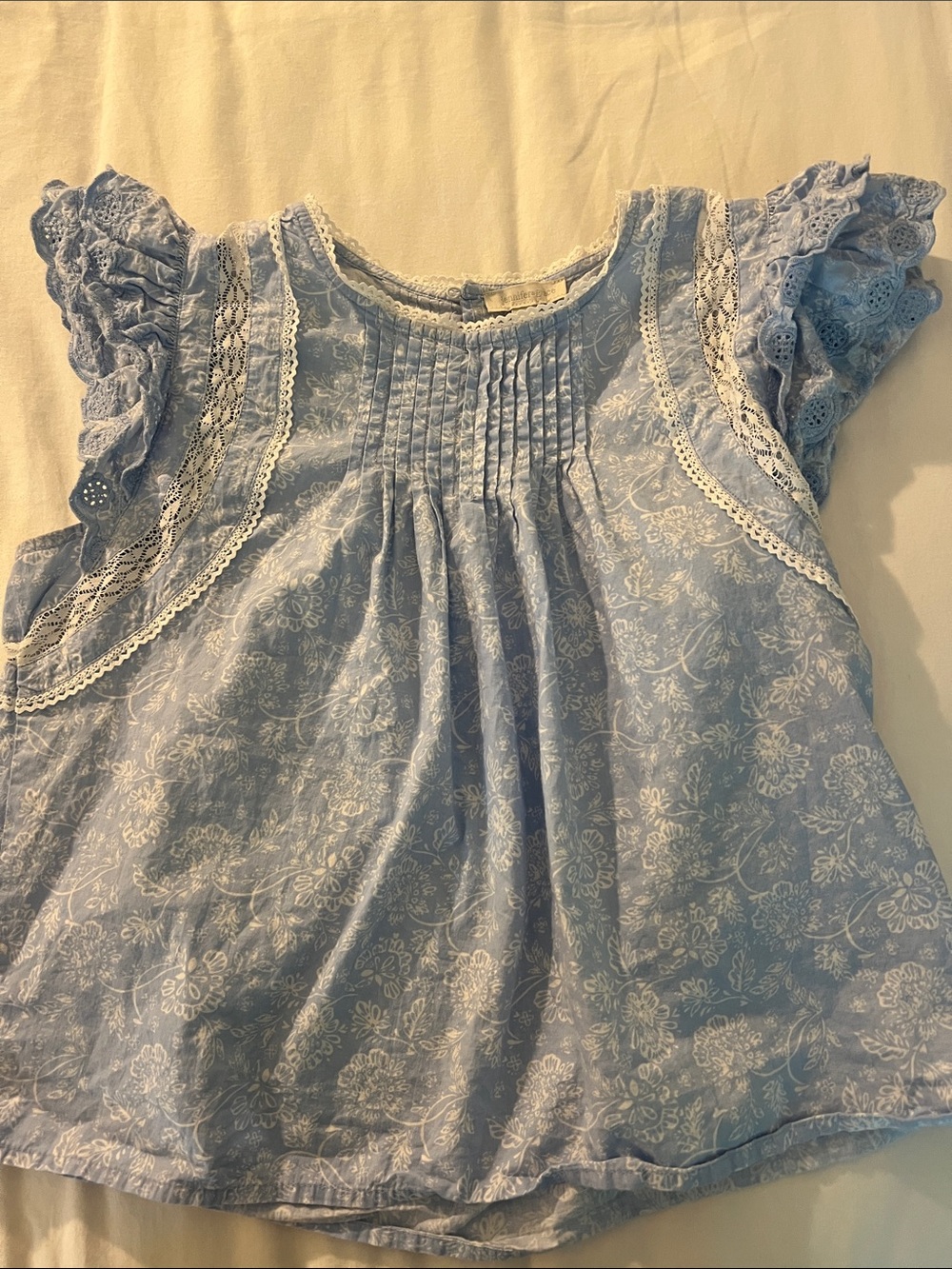light blue ruffle blouse